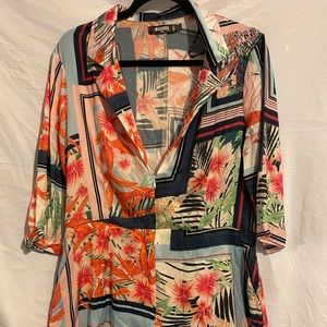 Tropical floral romper with pockets from Missguided